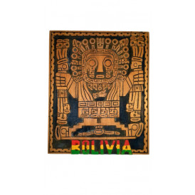 Carved wooden andean symbol of the god inti with letters from bolivia